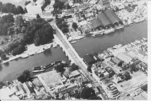 Aerial view of the Gridley Miskin timber yards on opposite sides of the river downstream of the bridge. Picture probably taken in the 1970’s.