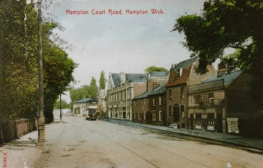 The section of track from Kingston Bridge to Hampton Court was provided with superior (and costly) granite sett blocks. The Dew Drop Inn is shown on the right of the postcard.